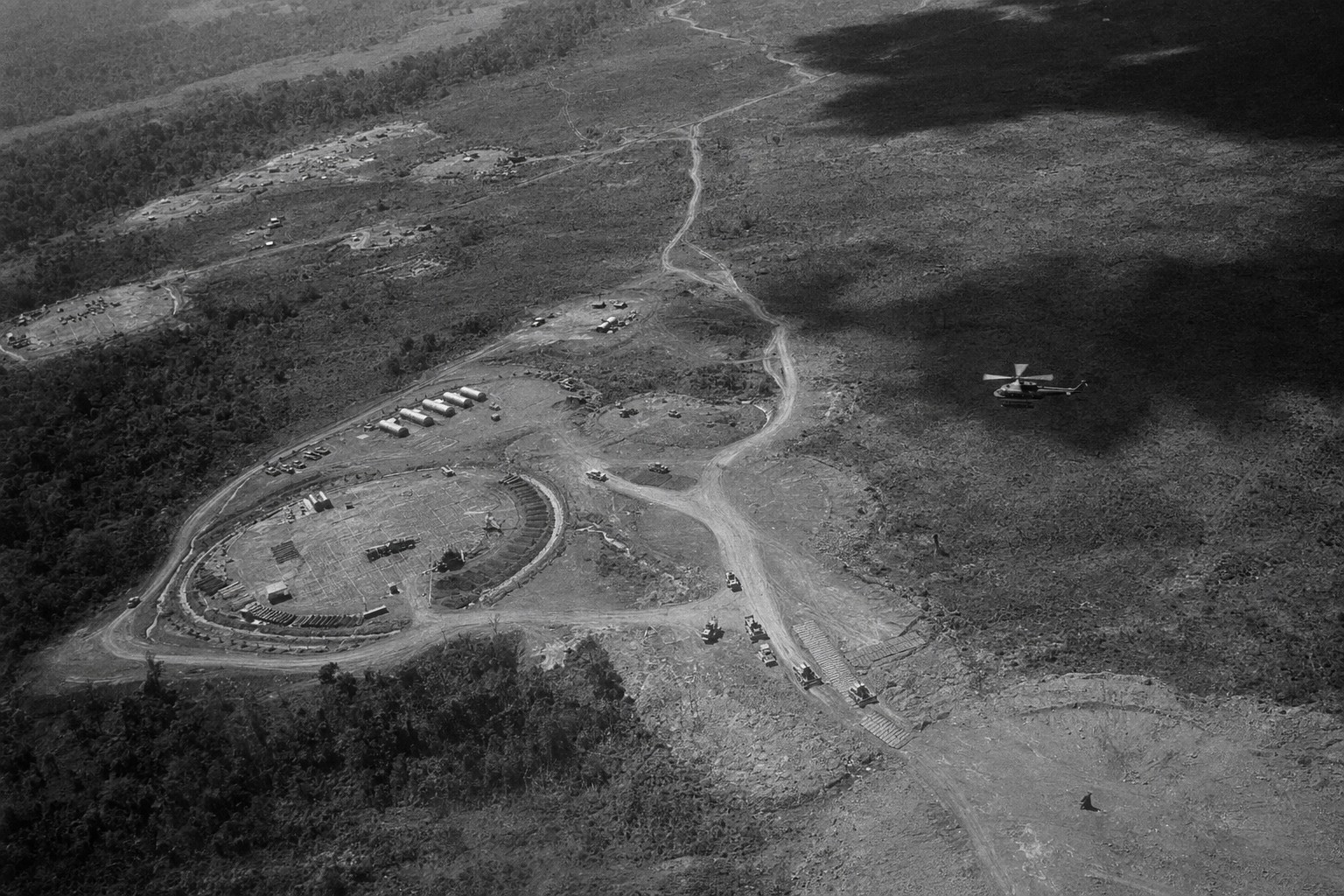 Oblique aerial view of Fishhook firebases and supply pads during the CMFF wind-down, 1974.